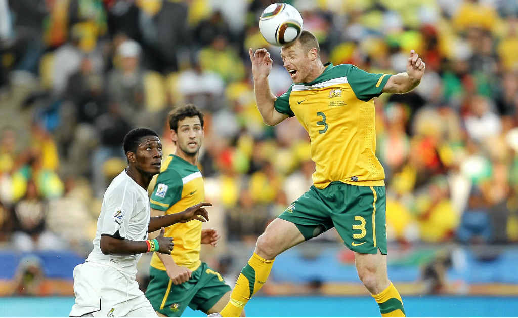 Socceroo Craig Moore, who will be in Lismore next month, goes up for a header during the 2010 FIFA World Cup in South Africa against Ghana. Socceroo Craig Moore, who will be in Lismore next month, goes up for a header during the 2010 FIFA World Cup in South Africa against Ghana.